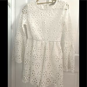 White eyelet dress aboce knee with detailed sleeve